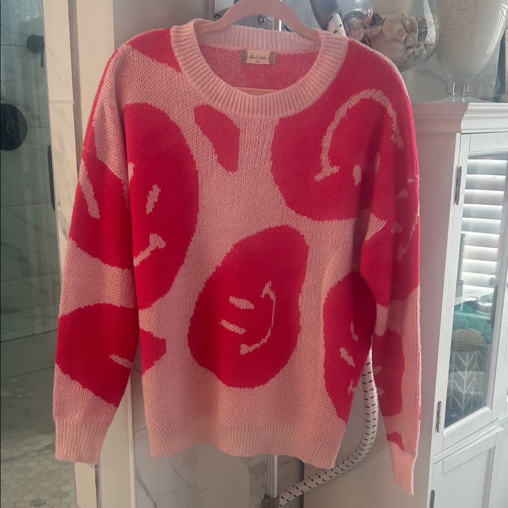 Altar’d State pink smiley face sweater